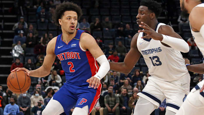 Detroit Pistons guard Cade Cunningham (2) dribbles as Memphis Grizzles forward Jaren Jackson Jr.